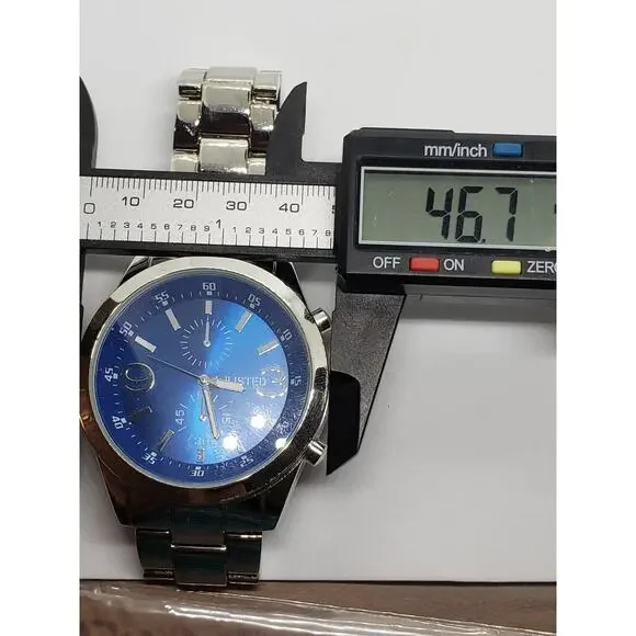 Unlisted Kenneth Cole 3010018527 10024676. Large blue face Working watch